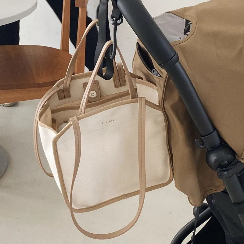 기저귀 가방 한국의 대용량 캔버스 방수 수분 방지 외출 포장 어린이 천 주최자 가방 유치원 미라 가방