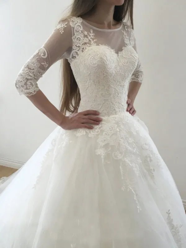 Luxury Puffy A Line Ball Gown Wedding Dress with Sleeves Illusion Bateau Neckline Lace Appliques Zipper Pearls Button Corset Bridal Gowns