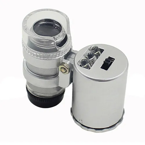 Magnifier del microscopio del microscopio di 60X mini binocoli della lente di ingrandimento dei binocoli della lente di ingrandimento di 60 x LED con la luce del LED + sacchetto di cuoio 2018 vendite calde