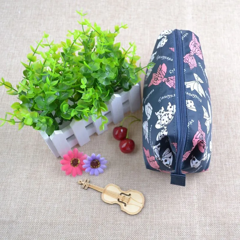Nueva bolsa de cosméticos súper bonita, Mini bolsa de maquillaje para mujer, bolsa cruzada portátil de viaje, 267T