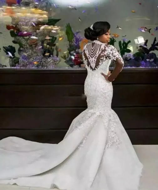 Luxury 2019 African Mermaid Wedding Dresses Long Sleeve Sexy Sheer High Neck Sparkle Beads Lace Satin Nigerian Chapel Bridal Gowns Plus Size