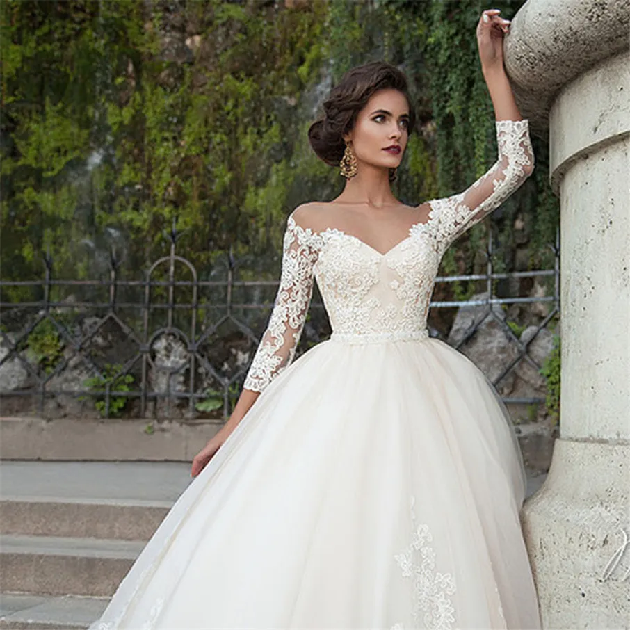 Off the Shoulder Long Sleeves Wedding Dress Tulle V-Neck Backless Pearls Belt Appliqes Lace Ball Gown Court Train Custom Bridal Gowns