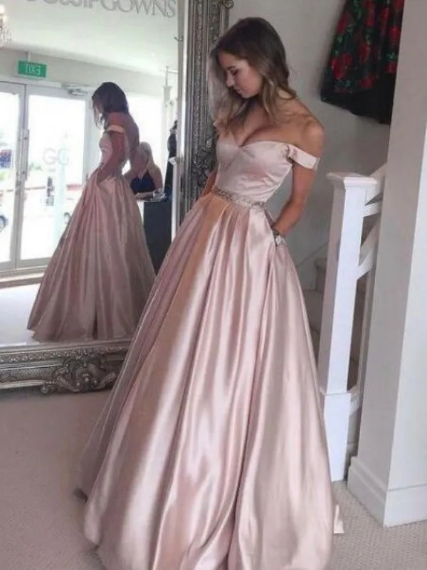 Impresionante una línea Blush Pink Prom Vestidos fuera del hombro Vestidos largos de fiesta formal Vestidos de longitud de piso con cintura moldeada y bolsillos