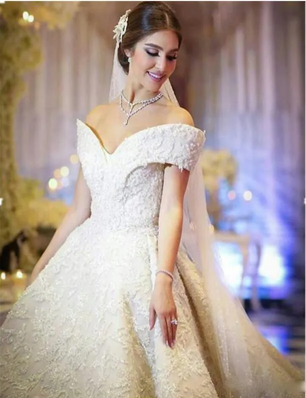 Luxury Off The Shoulder Wedding Dresses 2018 Spring Summer Lace Appliques Beads A Line Bridal Gowns Court Train Wedding Dress Arabic Vestido