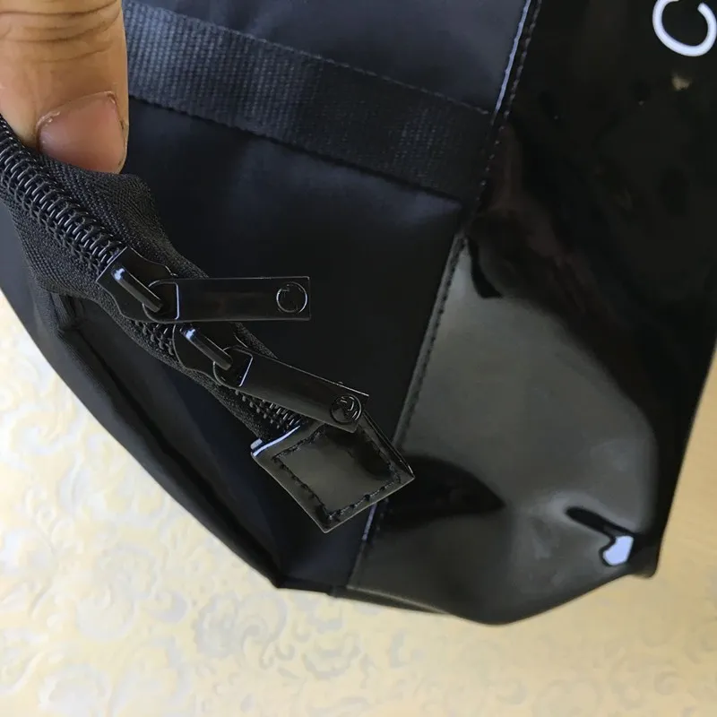 2017 NEUE berühmte marke schwarz einkaufen wasserdichte tuch klassische reisetasche damen lässig unterseite nähte PU tasche mode lässig b264W