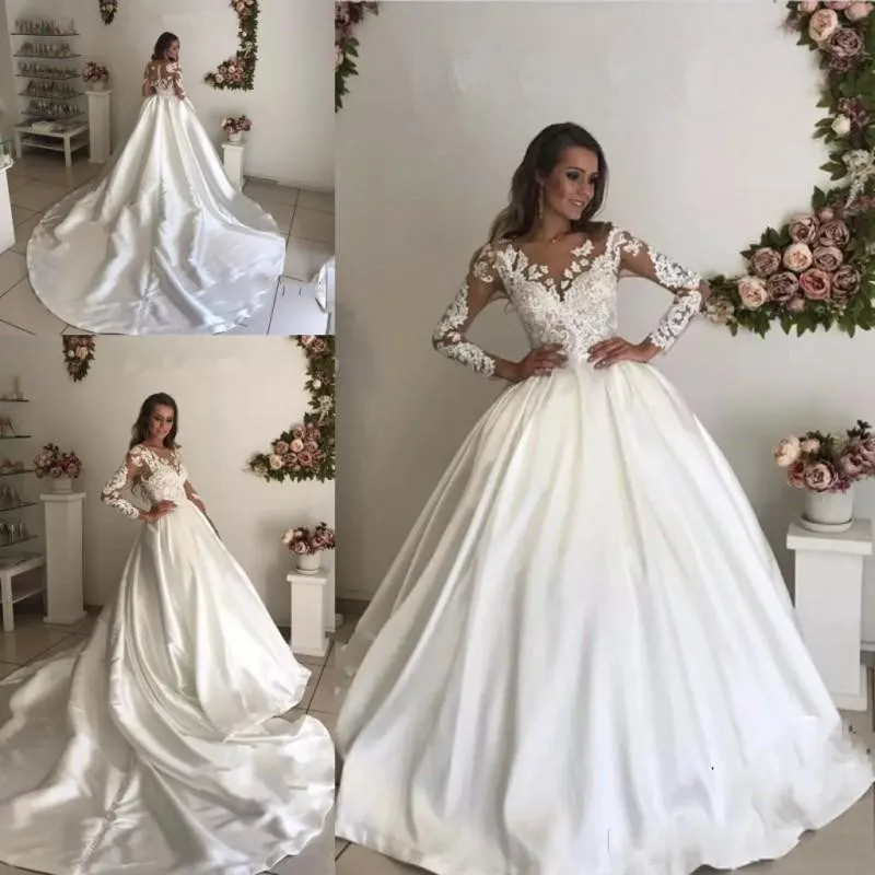 Plus Size Ball Gown Lace Wedding Dresses Sheer Neck Long Sleeves Illusion Back Wedding Dresses Applique Chapel Train Wedding Gowns Bridal