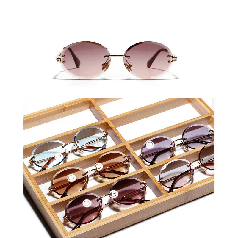 Diamentowe wycięte retro owalne okulary przeciwsłoneczne kobiety krystalicznie teksturowane okulary bez granic JW266D