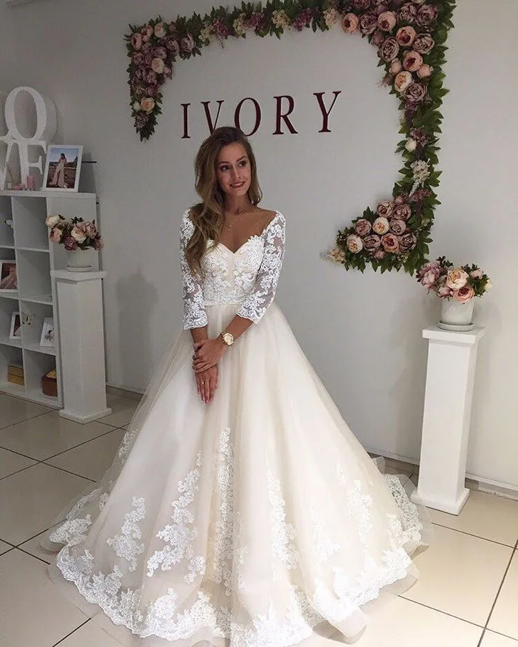 Sexy Elegant White Sheer Neck Applique Lace Wedding Dresses 3/4 Sleeves V Neck Sweep Train Wedding Dress Bridal Gowns Cheap Gowns