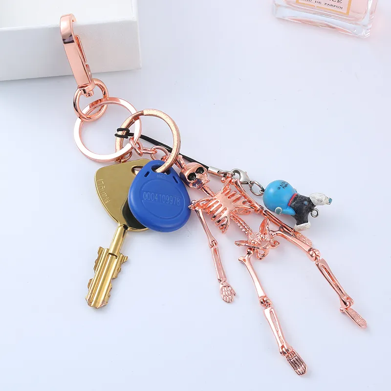 Opvouwbare skelet hanger sleutelhanger voor mannen vrouwen antiek zilver kleur metaallegering schedel tas charme sleutelhanger auto sleutelhanger Keyring236s