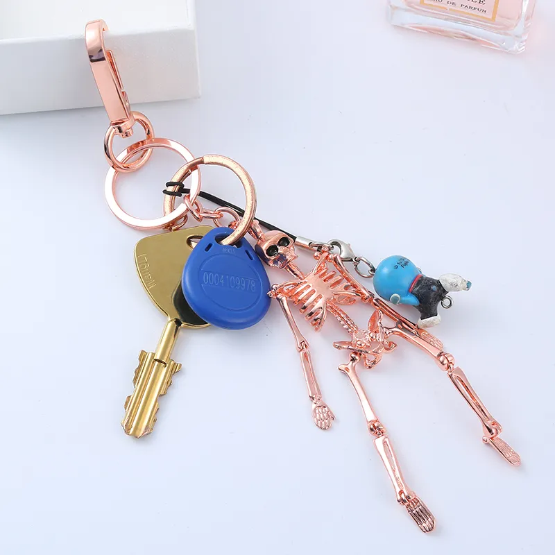 Porte-clés pendentif squelette pliable pour hommes et femmes, couleur argent Antique, alliage métallique, breloque pour sac, porte-clés de voiture, porte-clés 219g