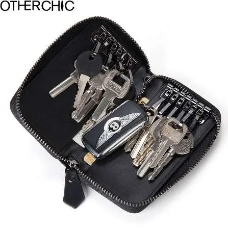 Inne Chycle Oryginalne skórzane klucze klucza Mężczyźni Kluczowe uchwyty gospodyni Keys Organizator Kobiety Klapeinki Pokrywa klucza samochodowego 7N03-57306O