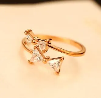 Marca coreana designer de zircônia cúbica bowknot anel moda banhado a ouro encantos anéis para mulheres263h