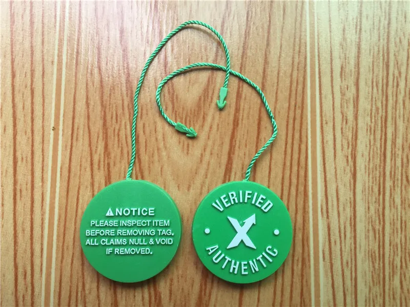 En stock X vert étiquette circulaire boucle de c