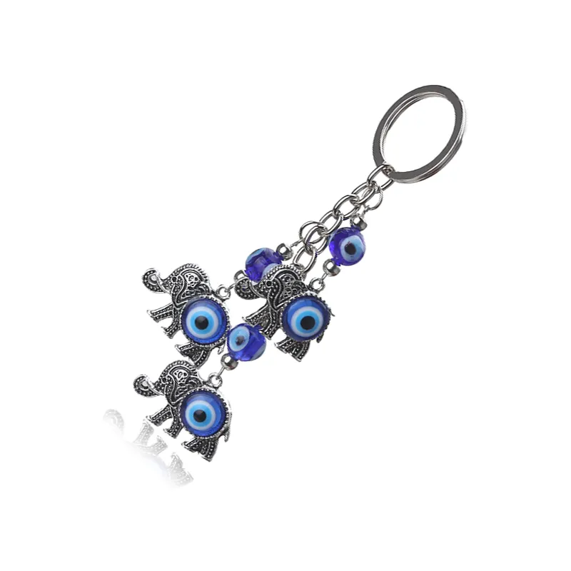 Porte-clés à breloques mauvais œil bleu, 1 pièce, pendentif éléphant, pompon en alliage, porte-clés de voiture, bijoux à la mode, cadeaux 287r