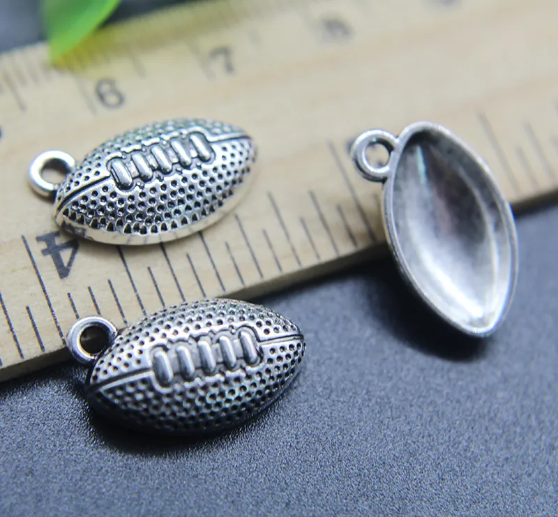 Ensemble 100 pièces pendentif à breloques de Football de Rugby rétro fabrication de bijoux bricolage porte-clés pendentif en argent ancien pour Bracelet boucles d'oreilles 17 1271W