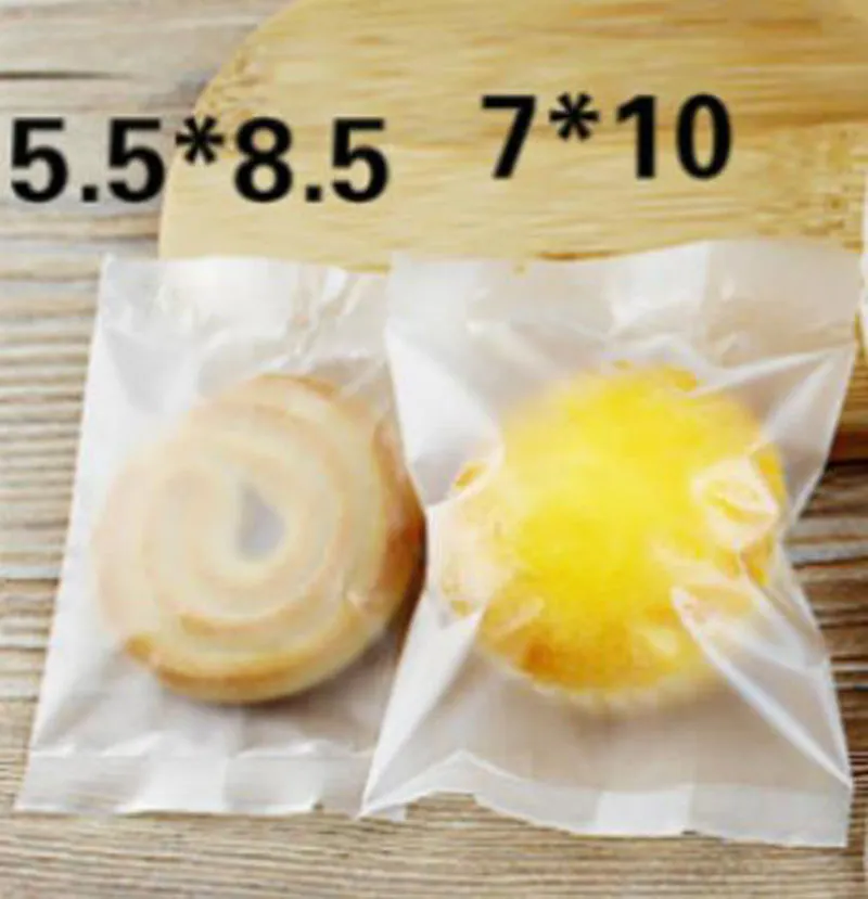 / Cellophane Gommage Cookie Sac de bonbons transparent pour cadeau Boulangerie Macaron Emballage en plastique Emballage Noël 4 tailles 256V