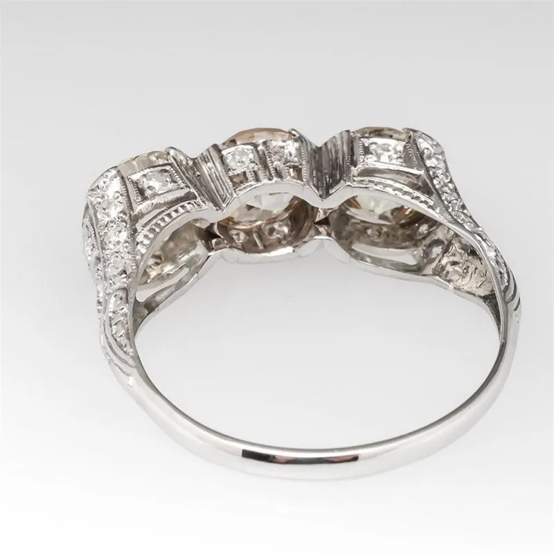 Vintage mode -sieraden 925 Sterling Silver Three Stone 5A Cubic Zirconia CZ Diamond Gemstones Women Wedding Engagement Band Ring 250N