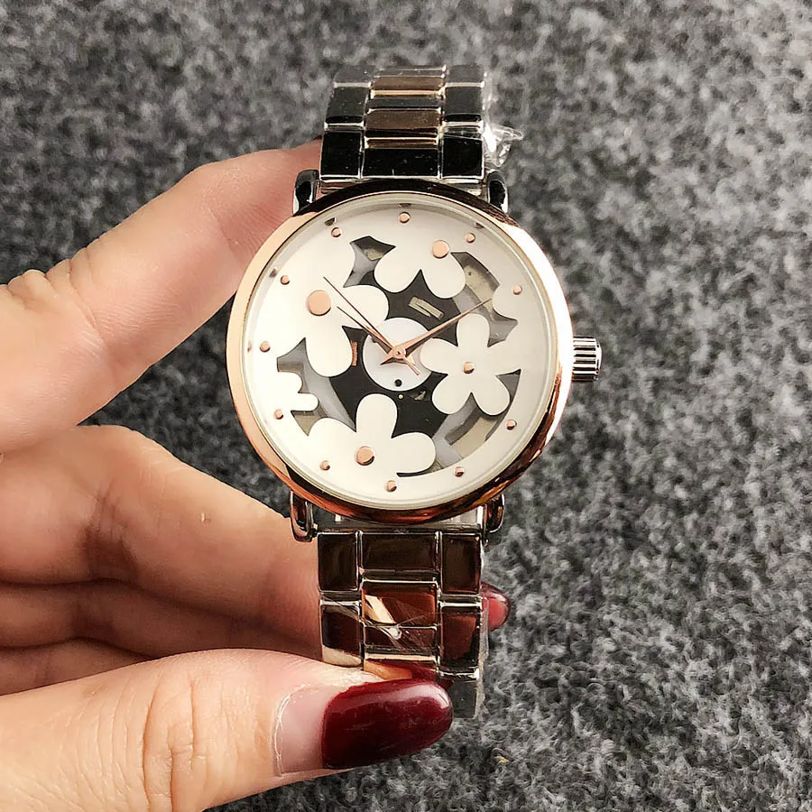 Moda m çiçek içi boş kadran tasarım markası watches kadın kız metal çelik grup kuvars bilek saat m73239z