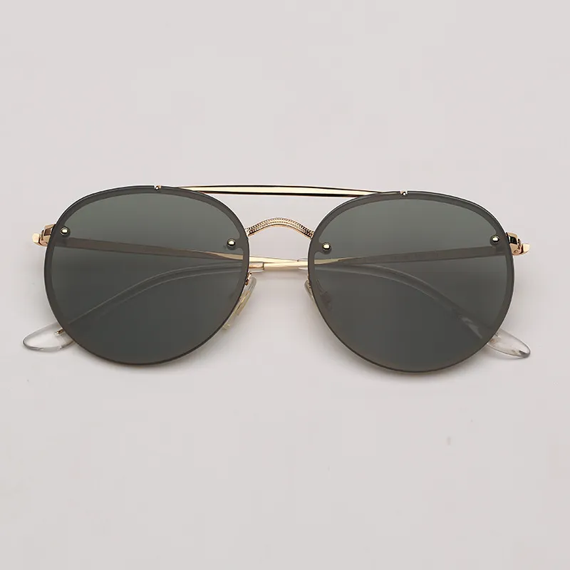 Okrągłe okrągłe okulary przeciwsłoneczne Kobiety retro vintage okulary przeciwsłoneczne dla mężczyzn projektant marki owalny ogień słoneczny Kobieta Oculos Uv400 Gafas de So282z