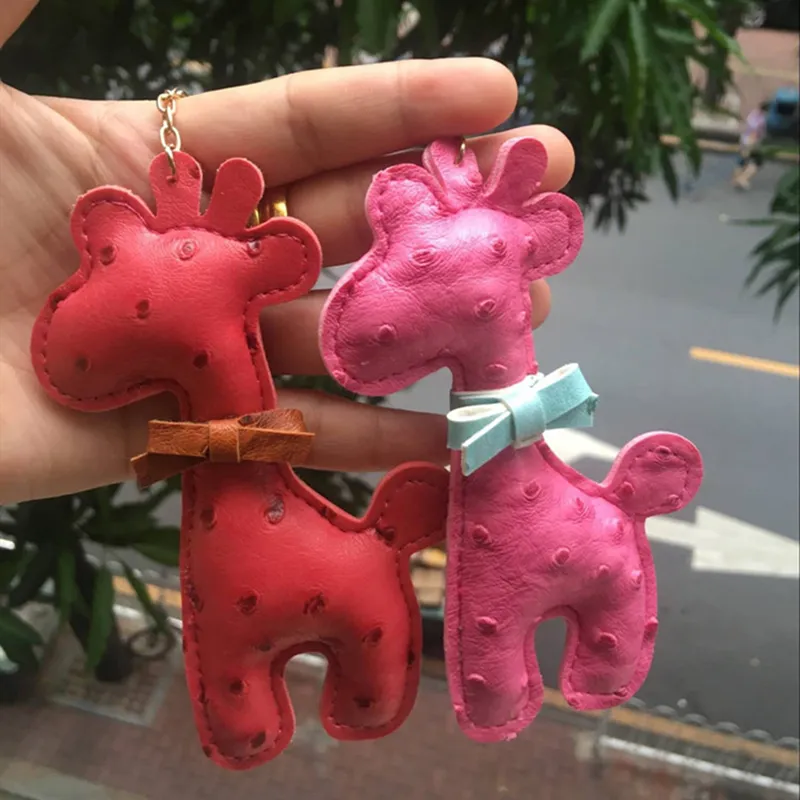 Chaves de couro PU Chaves de desenho animado projetos de animais Padrão padrão girafa Keyring Chave -chave do anel da corrente Mulheres BACA PENENTE JOWE301F