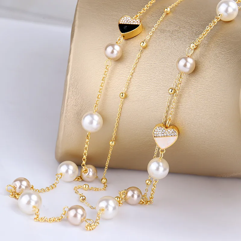 Collana di dichiarazione di maglione lungo multistrato di perle eleganti con cuore di diamanti carino classico di lusso di design intero donna3319