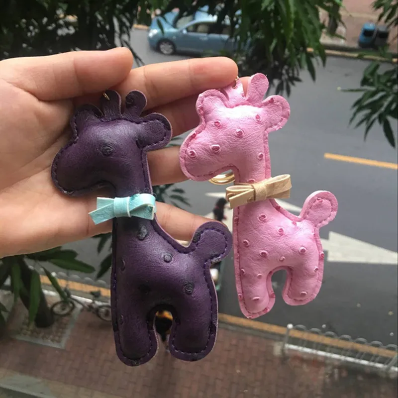 Chaves de couro PU Chaves de desenho animado projetos de animais Padrão padrão girafa Keyring Chave -chave do anel da corrente Mulheres BACA PENENTE JOWE301F