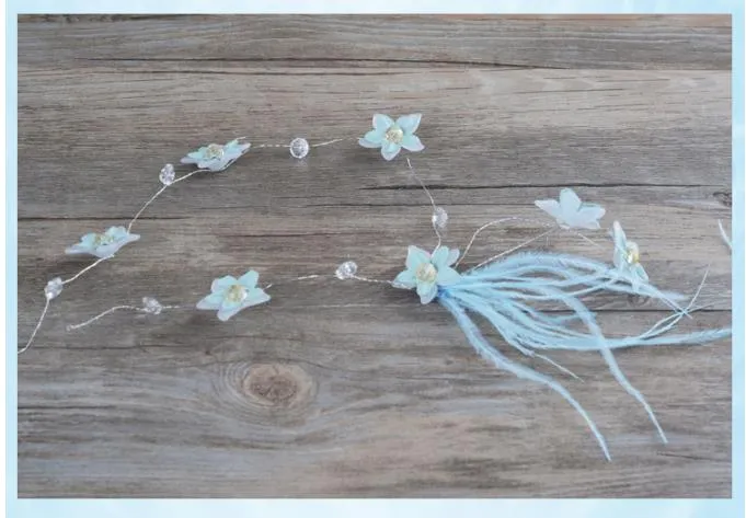 Pale blue handmade beads with feathers flowers hair ornaments wedding headdresses dresses and accessories249L