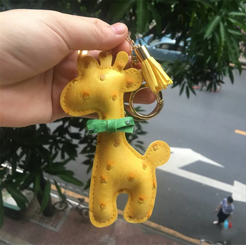 Chaves de couro PU Chaves de desenho animado projetos de animais Padrão padrão girafa Keyring Chave -chave do anel da corrente Mulheres BACA PENENTE JOWE301F