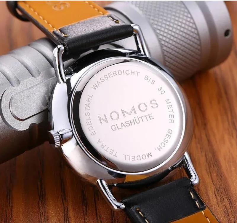 ファッションカジュアルブランドノモス防水革のビジネスクォーツ時計メンドレスウォッチwomen308s