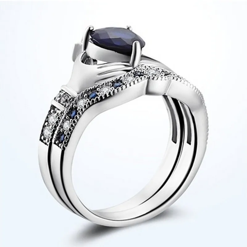OMHXZJ Whole Solitaire Rings European Fashion Woman Man Party Wedding Gift Crown White Blue Zircon 18KT White Gold Ring RR6016735283