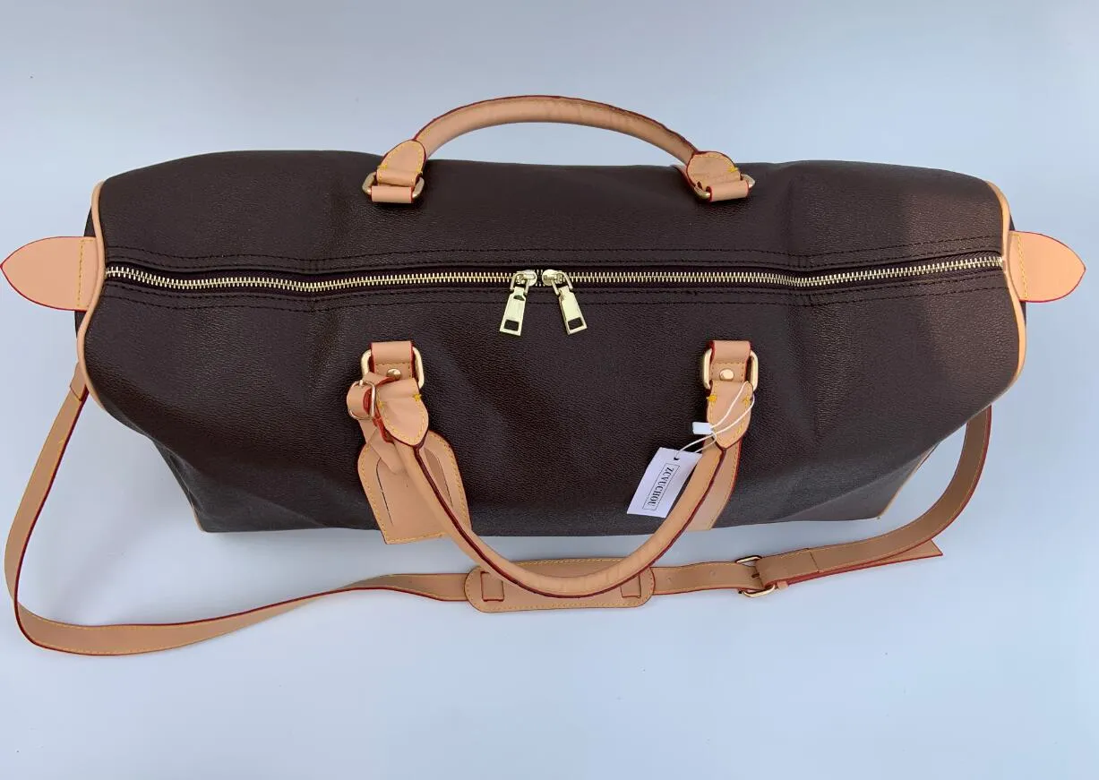 Bolsas de mochila tamanho 60 cm de preto marrom pvc flor de feriado de férias masculinas para mulheres bolsas de viagem Bolsas de designer de bagagem de grande capacidade O335A
