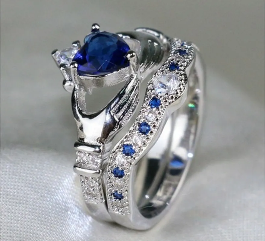 OMHXZJ Whole Solitaire Rings European Fashion Woman Man Party Wedding Gift Crown White Blue Zircon 18KT White Gold Ring RR6012858772
