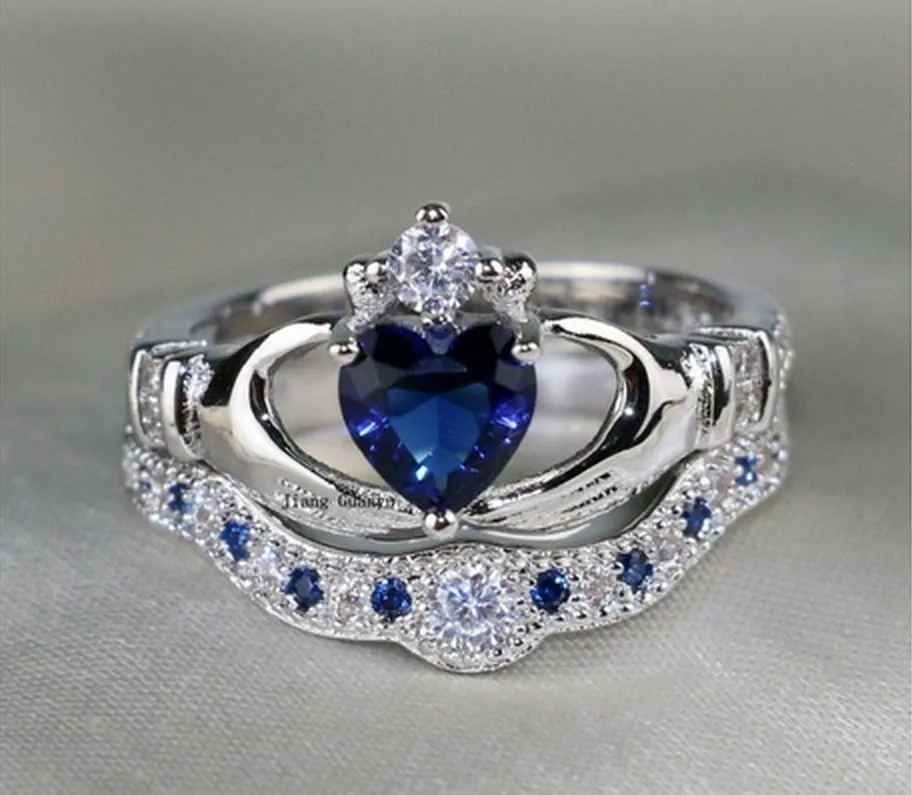 OMHXZJ Whole Solitaire Rings European Fashion Woman Man Party Wedding Gift Crown White Blue Zircon 18KT White Gold Ring RR6016735283