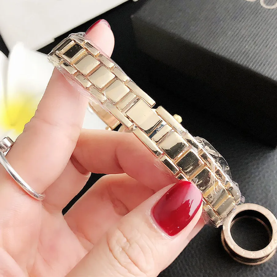 Montres de marque de mode pour femmes filles bracelet en cristal style acier bande métallique montre-bracelet à quartz P74