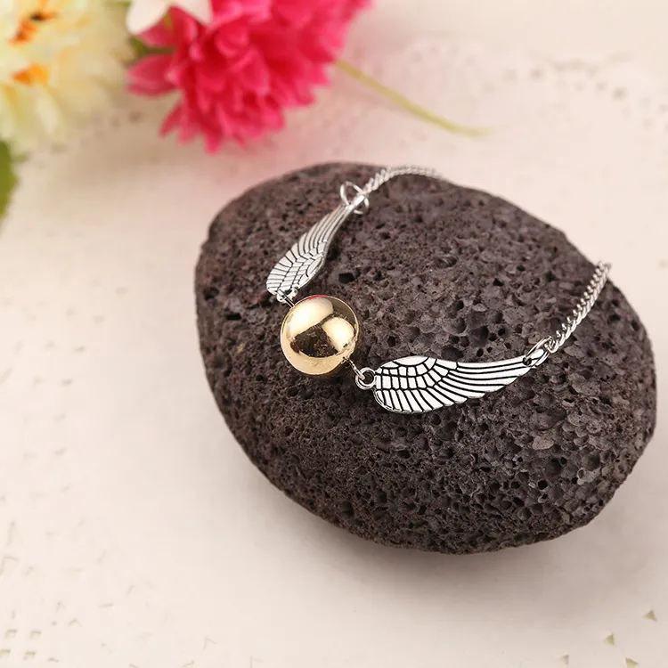 Фильм -ювелирные украшения подвесной браслет The Deathly Hallows Antique Bronze Snitch The Golden Snitch Bracelet Бесплатная доставка 7843273