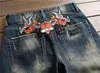 2023 Toptan yeni moda yaz Kış Kış Yüksek Kaliteli Gül İşlemeli Düz İnce Fit Baskılı Kot Biker Denim Pantolon A1