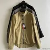 남성 재킷 2023 스프링 캐주얼 까마귀 CP 셔츠 긴 소매 재킷 주머니 회사 고글 렌즈 장식 지퍼 얇은 영국 고가 코트 스웨트 셔츠 0FZC