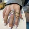 Struttura metallica geometrica irregolare alla moda per l'anello congiunto aperto per la personalità delle donne