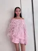 2023年秋/冬の新しいピンクの女の子のトップフェザーデコレーションスリーブTシャツミディアムロング女性セーター