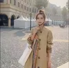 2023 Projektant 2022 Płaszcz Europejski i Ameryki Plaid Style moda Fałszywe dwa luźne kobiety średniej długości płaszcze Wuliu7