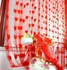 結婚式の背景カーテンラブハートタッセルスクリーン室仕切りロッドポケットドアシアーカーテンパーティーデコレーション小物カラフルなギフト25ピース