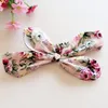 Yaz Bebek Çocukları Yeni yürümeye başlayan çocuklar bebek çiçek baskılı pamuklu çiçekçiler şort kızlar pp pantolon bowknot kafa bandı çocuk kıyafetleri 2pcs7173624