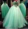 Robes de bal à balle verte de la menthe 2015 Crystals de bal de perles Robes de bal de corset étonnantes Laceup Back Shining Rucched Puffy Tulle Formal4371510