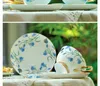 中国陶磁器のコーヒーのマグカップティーカップの青い花柄良い品質ヨーロッパのスタイル