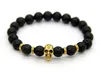 2015 Nya produkter Hela 10st Lot Beaded 8mm Lava Stone Beads 24k Gold Skull Elastic Armband för män och kvinnors gåva2719