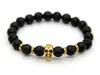 2015 Nya produkter Hela 10st Lot Beaded 8mm Lava Stone Beads 24k Gold Skull Elastic Armband för män och kvinnors gåva2762