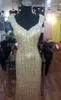 Elegante Gold -Pailletten Promi -Kleider funkelnder Perlenkragen Lange formale Abendkleider Empfangskleider roter Teppich Kleider Bankett 269g