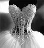 Luxury Wedding Dresses With Lace Pearl Beads Unique Arabic Bridal Gowns Sweetheart Neck Zip Back White Tulle Princess Wedding Gowns