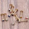 Barre à lèvres en or 100pcs / lot mélanger 7 couleurs bijoux de corps en acier piercing lèvre anneau labret229e