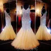 Cheap Bling Sexy Evening Dresses Wear V Neck Crystal Major Beading Illusion Mermaid Long Criss Cross Back Formal Vestidos Prom Party Gowns